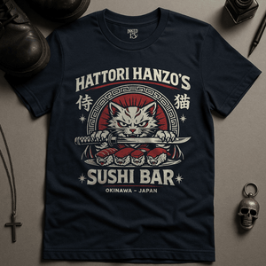 Navy blue t-shirt with a cat holding a sword design and text on a gray surface.